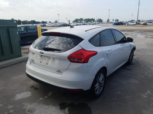 Photo 3 VIN: 1FADP3K28GL216951 - FORD FOCUS SE 