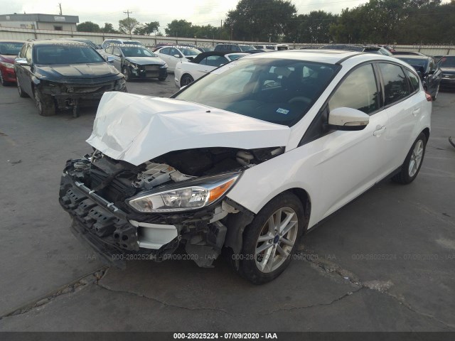 Photo 1 VIN: 1FADP3K28GL284084 - FORD FOCUS 