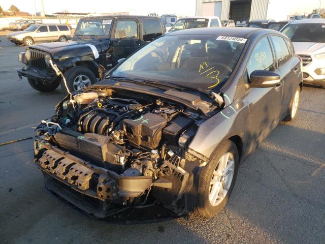 Photo 1 VIN: 1FADP3K28GL301496 - FORD FOCUS SE 