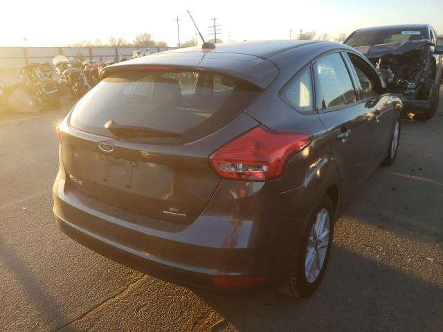 Photo 3 VIN: 1FADP3K28GL301496 - FORD FOCUS SE 