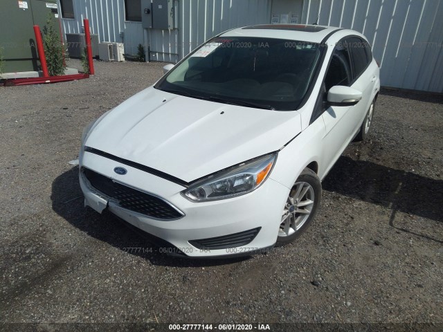 Photo 1 VIN: 1FADP3K28GL338631 - FORD FOCUS 