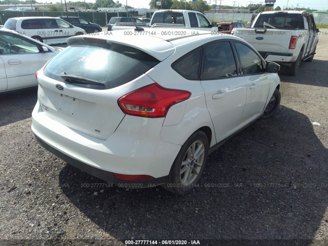 Photo 3 VIN: 1FADP3K28GL338631 - FORD FOCUS 