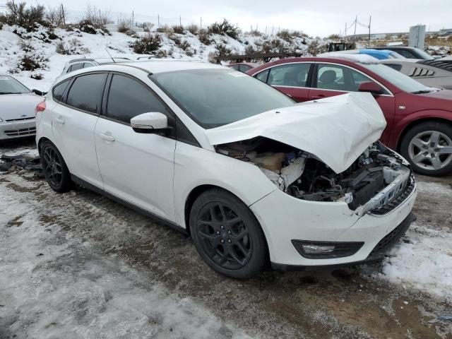 Photo 3 VIN: 1FADP3K28GL351282 - FORD FOCUS SE 