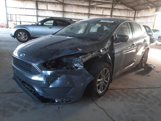 Photo 1 VIN: 1FADP3K28JL206749 - FORD FOCUS 