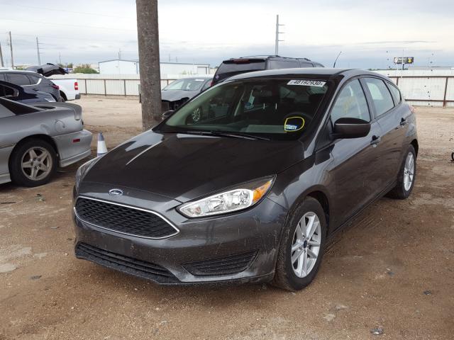 Photo 1 VIN: 1FADP3K28JL229562 - FORD FOCUS SE 