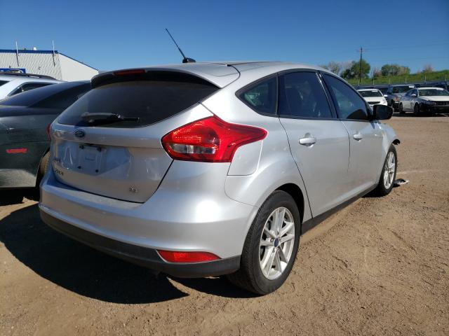 Photo 3 VIN: 1FADP3K28JL258558 - FORD FOCUS SE 