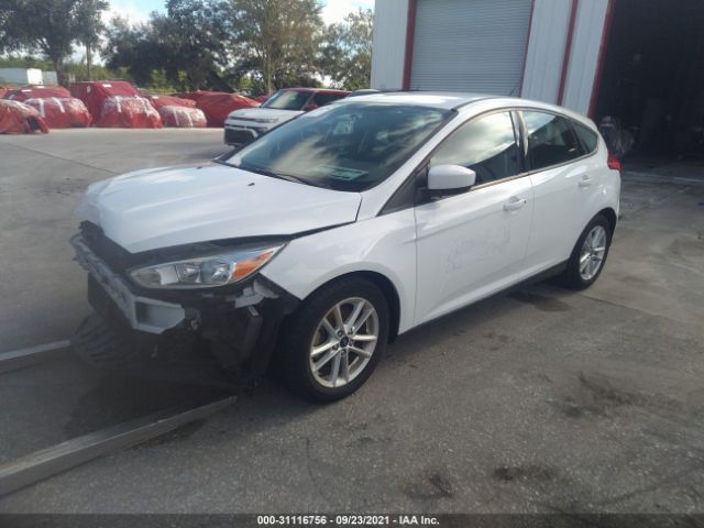 Photo 1 VIN: 1FADP3K28JL300016 - FORD FOCUS 