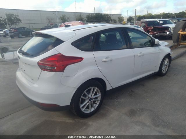 Photo 3 VIN: 1FADP3K28JL300016 - FORD FOCUS 