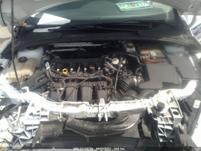 Photo 9 VIN: 1FADP3K28JL300016 - FORD FOCUS 