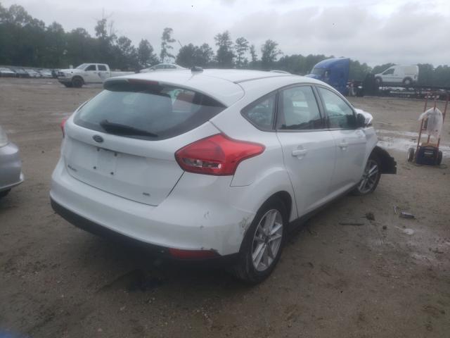 Photo 3 VIN: 1FADP3K28JL327121 - FORD FOCUS SE 