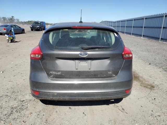 Photo 5 VIN: 1FADP3K28JL329922 - FORD FOCUS SE 