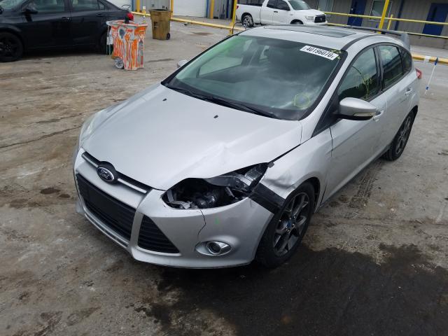 Photo 1 VIN: 1FADP3K29DL164774 - FORD FOCUS SE 