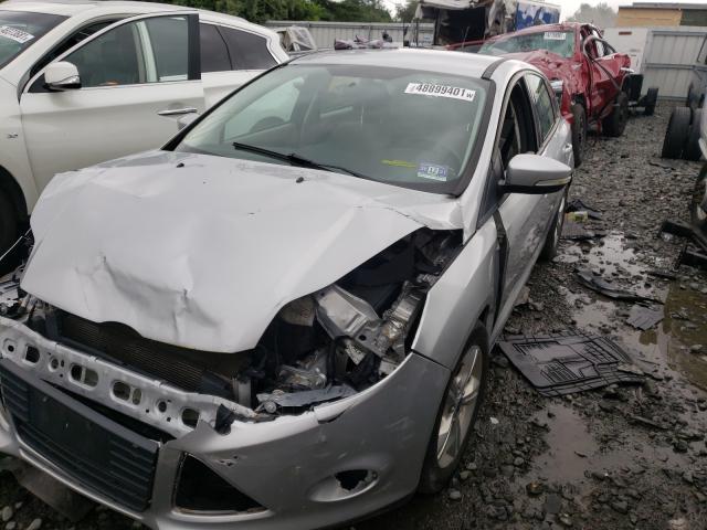 Photo 1 VIN: 1FADP3K29DL261201 - FORD FOCUS SE 