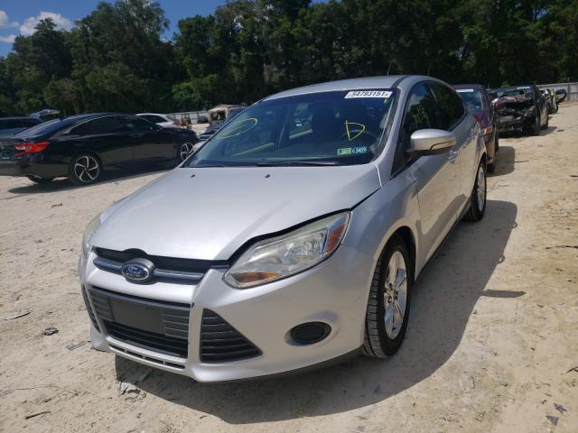 Photo 1 VIN: 1FADP3K29EL307580 - FORD FOCUS SE 