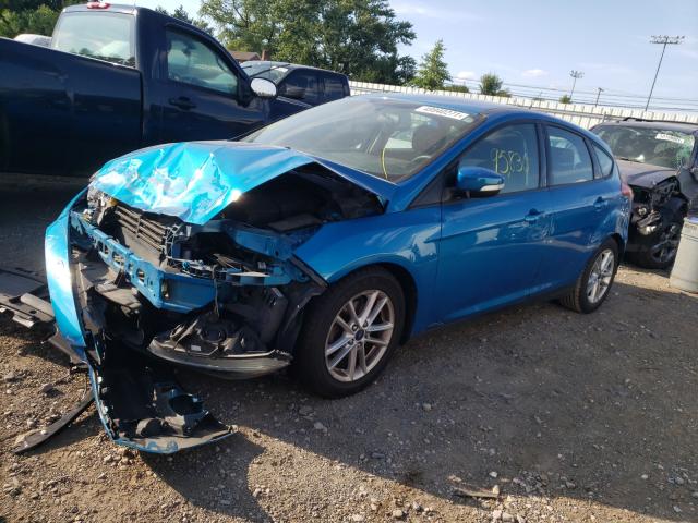 Photo 1 VIN: 1FADP3K29GL214142 - FORD FOCUS SE 