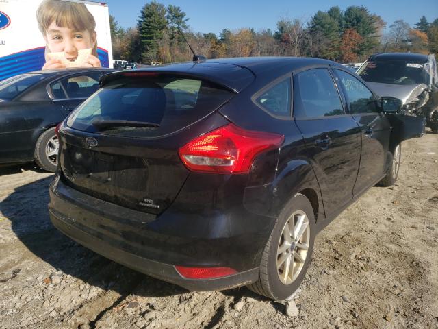 Photo 3 VIN: 1FADP3K29GL235962 - FORD FOCUS SE 