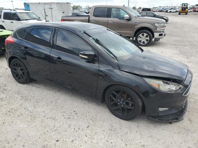 Photo 3 VIN: 1FADP3K29GL302513 - FORD FOCUS SE 