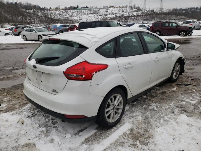 Photo 3 VIN: 1FADP3K29GL306612 - FORD FOCUS SE 