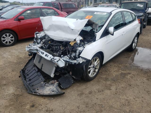 Photo 1 VIN: 1FADP3K29GL324785 - FORD FOCUS SE 