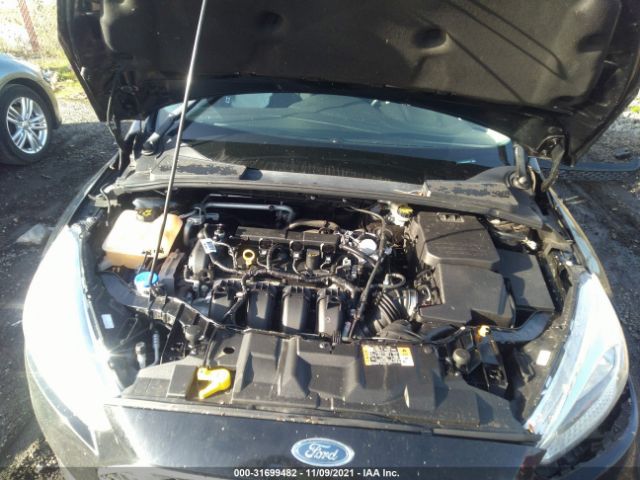 Photo 9 VIN: 1FADP3K29GL324821 - FORD FOCUS 