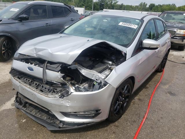 Photo 1 VIN: 1FADP3K29GL330327 - FORD FOCUS SE 