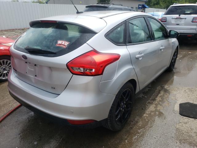 Photo 3 VIN: 1FADP3K29GL330327 - FORD FOCUS SE 