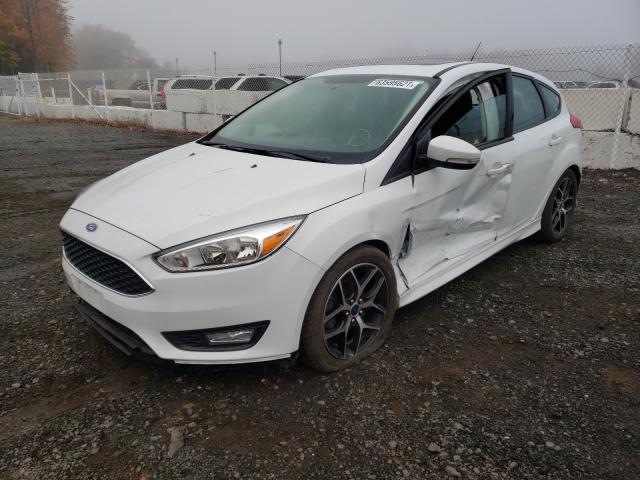 Photo 1 VIN: 1FADP3K29GL384789 - FORD FOCUS SE 