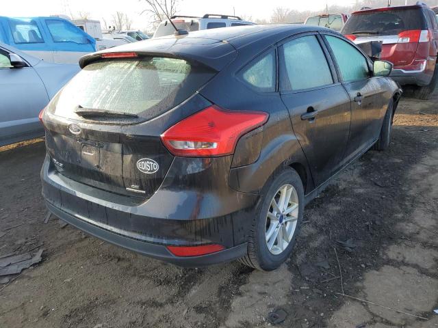 Photo 3 VIN: 1FADP3K29GL394321 - FORD FOCUS SE 