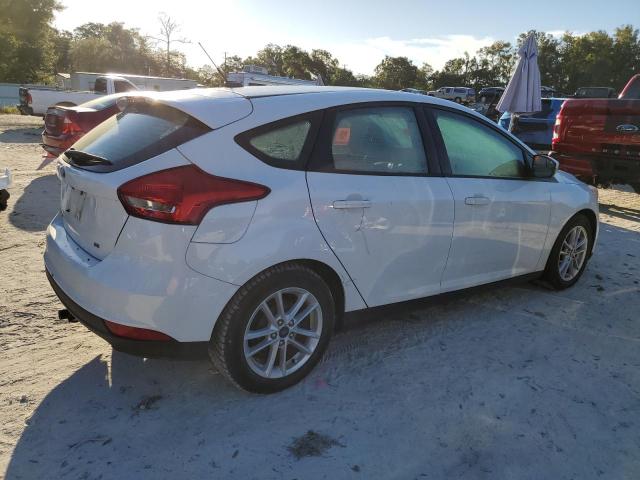 Photo 2 VIN: 1FADP3K29HL294477 - FORD FOCUS SE 