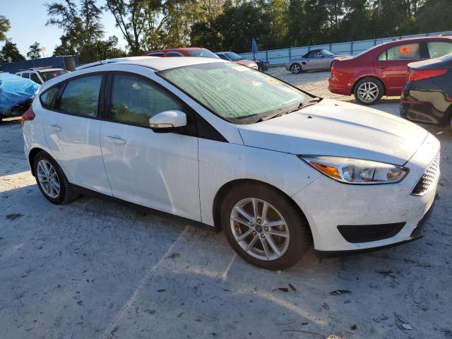 Photo 3 VIN: 1FADP3K29HL294477 - FORD FOCUS SE 