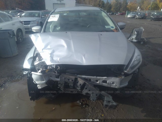 Photo 5 VIN: 1FADP3K29HL330569 - FORD FOCUS 