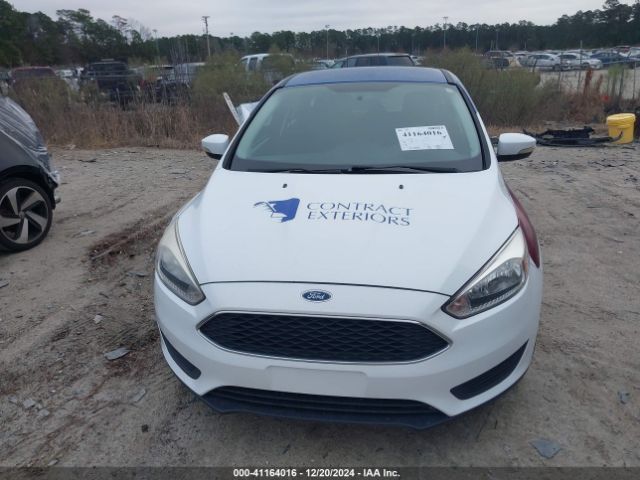 Photo 5 VIN: 1FADP3K29HL345637 - FORD FOCUS 