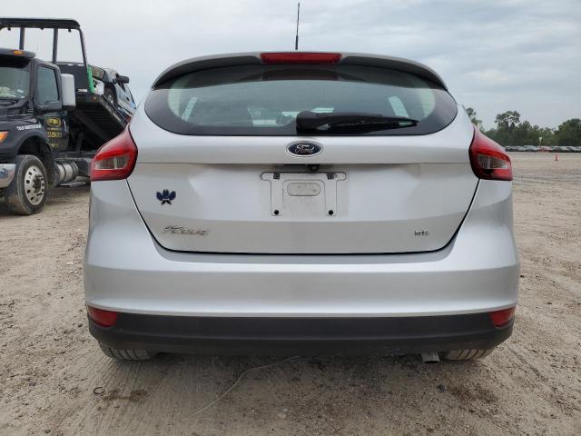 Photo 5 VIN: 1FADP3K29JL302857 - FORD FOCUS SE 