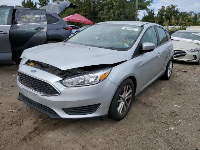 Photo 1 VIN: 1FADP3K29JL327046 - FORD FOCUS SE 