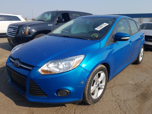 Photo 1 VIN: 1FADP3K2XDL169286 - FORD FOCUS SE 