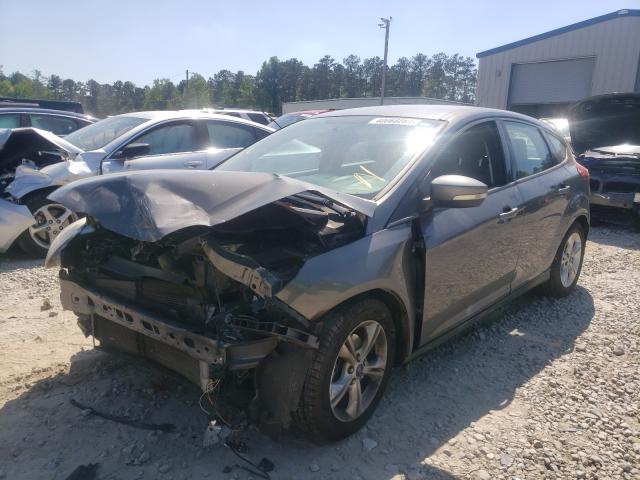 Photo 1 VIN: 1FADP3K2XDL325701 - FORD FOCUS SE 