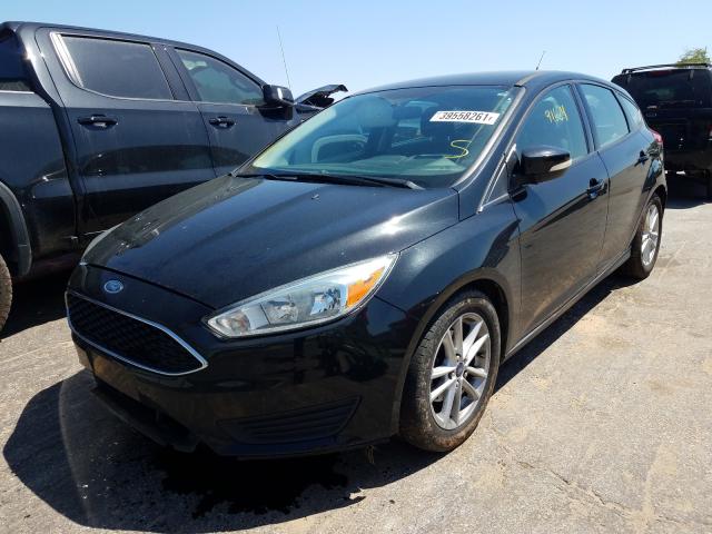 Photo 1 VIN: 1FADP3K2XFL249769 - FORD FOCUS SE 