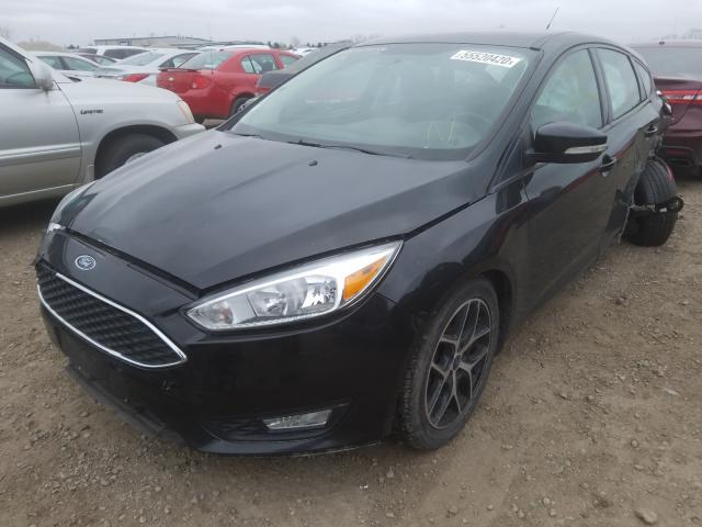 Photo 1 VIN: 1FADP3K2XFL253384 - FORD FOCUS SE 