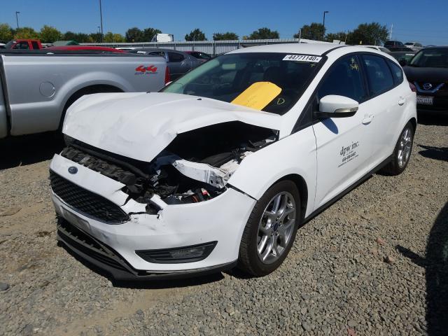 Photo 1 VIN: 1FADP3K2XFL324955 - FORD FOCUS SE 