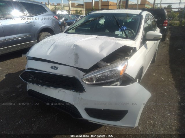 Photo 5 VIN: 1FADP3K2XGL222458 - FORD FOCUS 