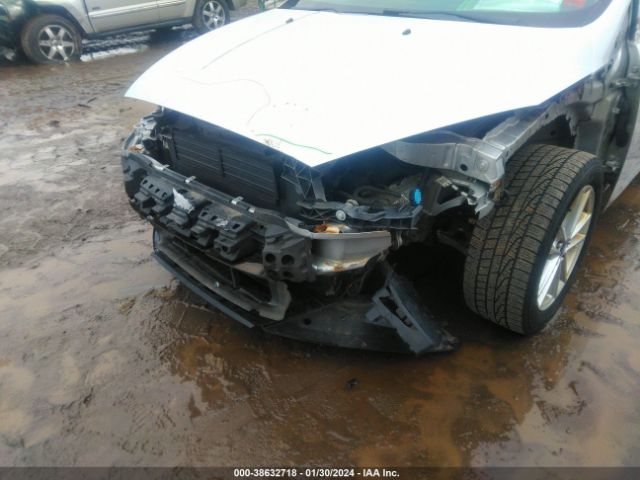 Photo 5 VIN: 1FADP3K2XGL263589 - FORD FOCUS 