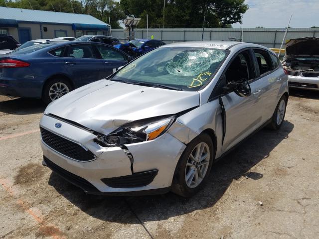 Photo 1 VIN: 1FADP3K2XGL283227 - FORD FOCUS SE 