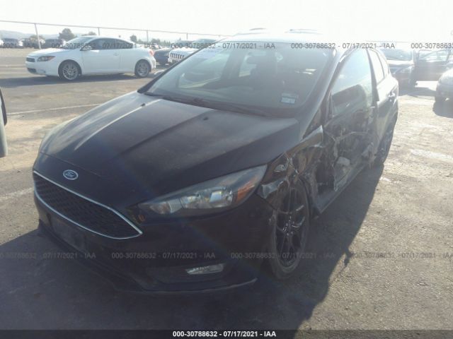 Photo 1 VIN: 1FADP3K2XGL285205 - FORD FOCUS 