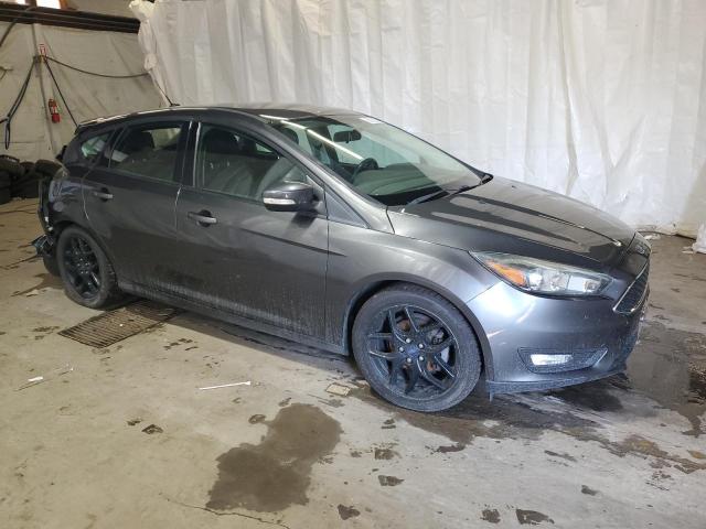 Photo 3 VIN: 1FADP3K2XGL299573 - FORD FOCUS SE 