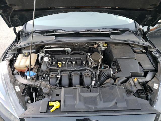 Photo 11 VIN: 1FADP3K2XGL317375 - FORD FOCUS SE 