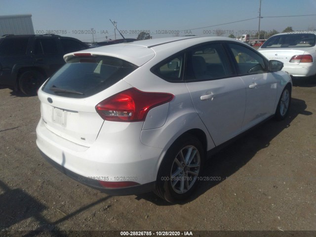 Photo 3 VIN: 1FADP3K2XGL320454 - FORD FOCUS 