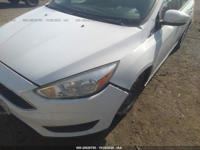 Photo 5 VIN: 1FADP3K2XGL320454 - FORD FOCUS 