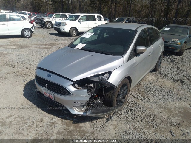 Photo 5 VIN: 1FADP3K2XGL330398 - FORD FOCUS 