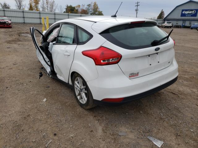 Photo 2 VIN: 1FADP3K2XGL352420 - FORD FOCUS SE 