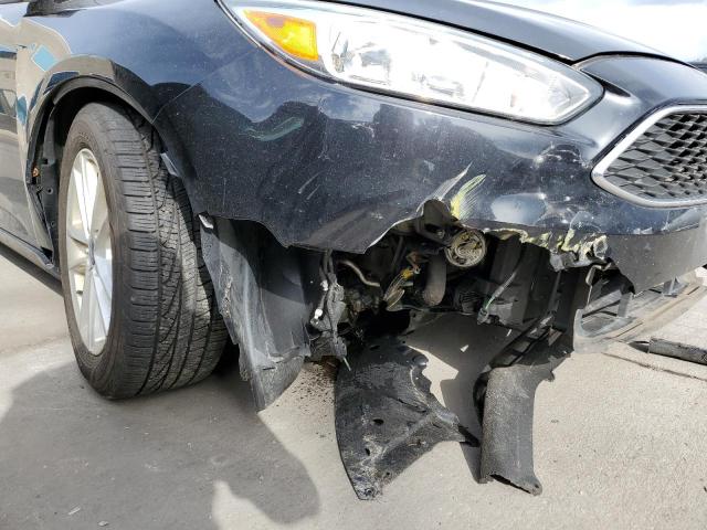 Photo 8 VIN: 1FADP3K2XGL379620 - FORD FOCUS SE 